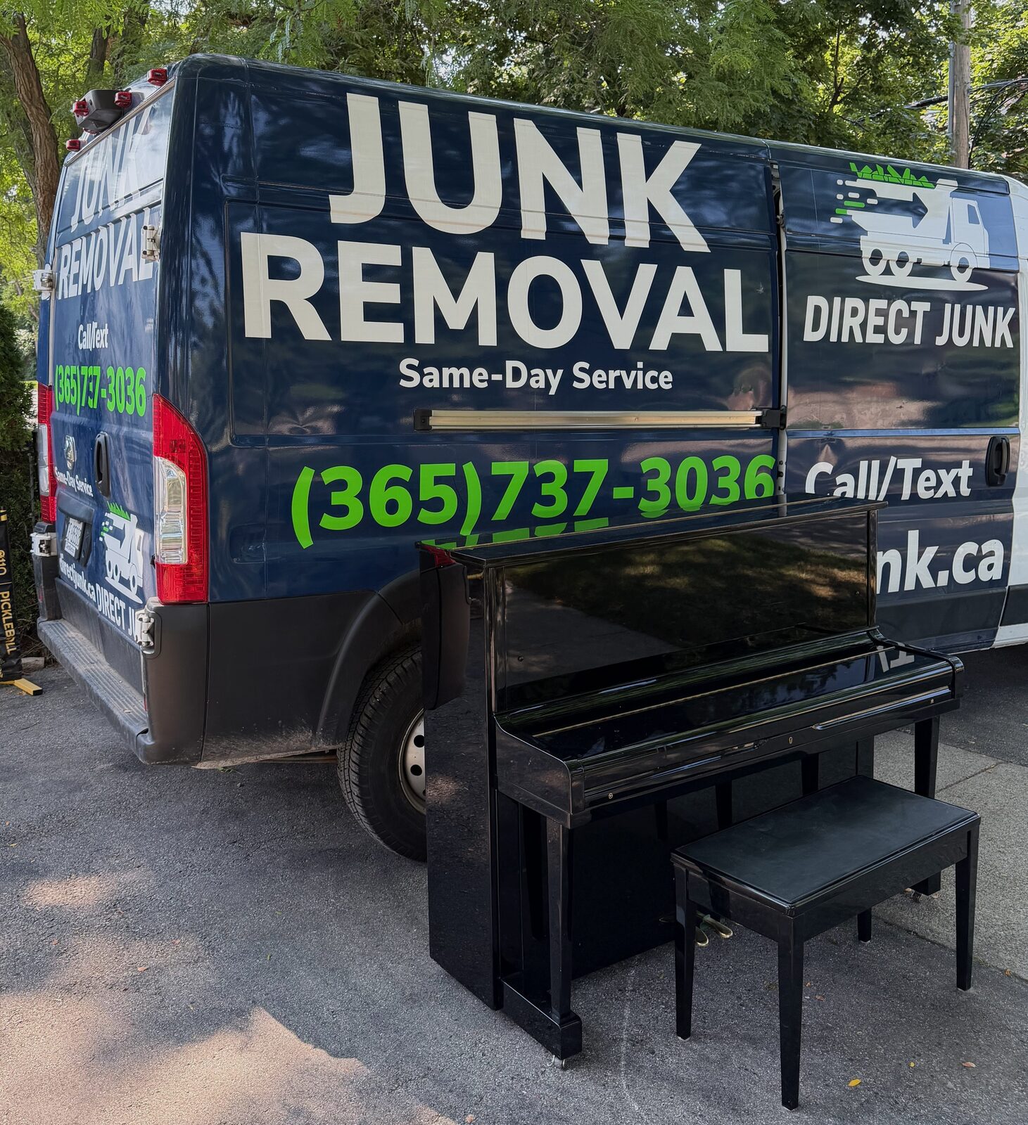 Piano removal ready for loading into Direct Junk truck in Burlington